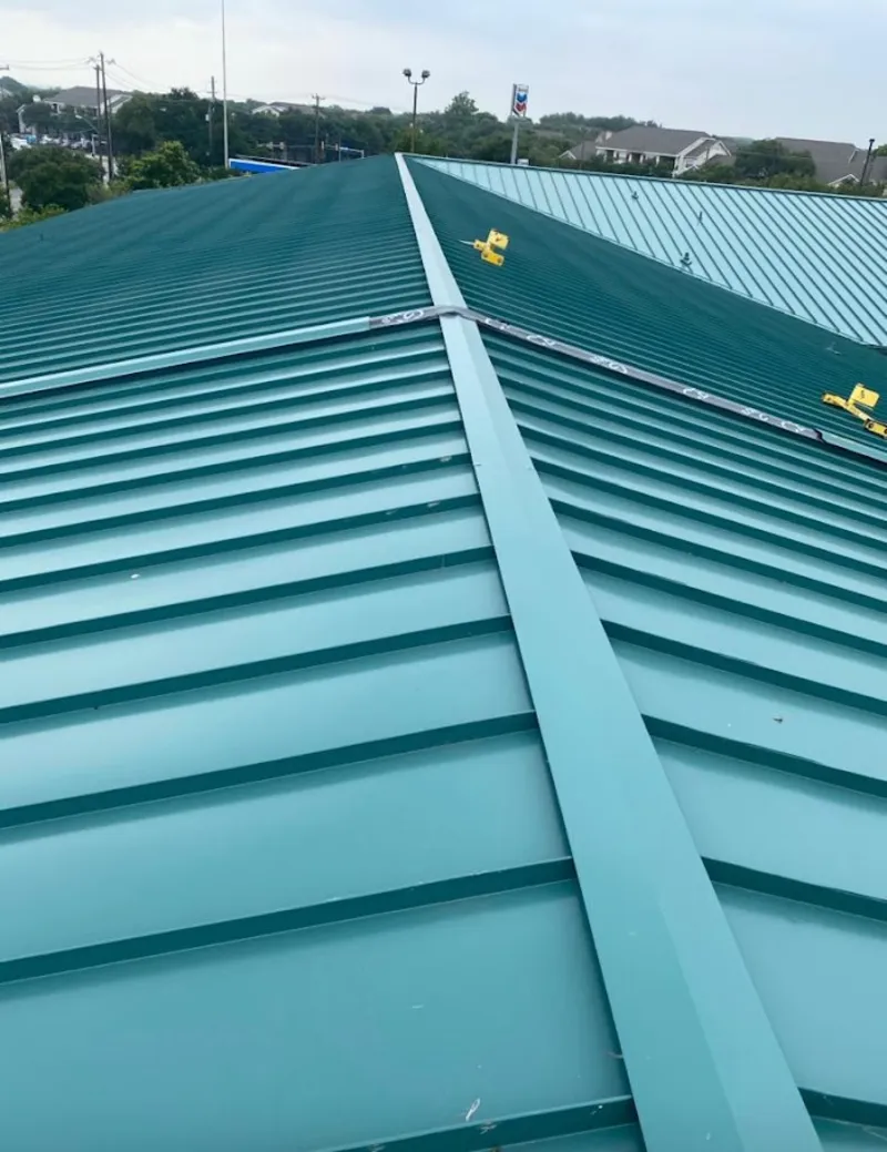 Green commercial metal roof ridge and valley for Metal Roof Repair in Tecumseh